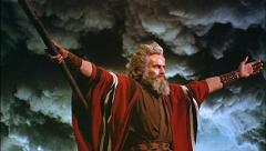 Charlton Heston in his virtually defining role as Moses parting the waters of the Red Sea in DeMille's The Ten Commandments Charlton Heston as Moses in The Ten Commandments