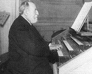 Charles Camille Saint-Saëns at the organ Charles Camille Saint-Saëns at the organ