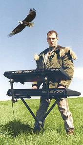 Mark J Cairns - photo with keyboards and eagle Mark J Cairns - photo with keyboards and eagle